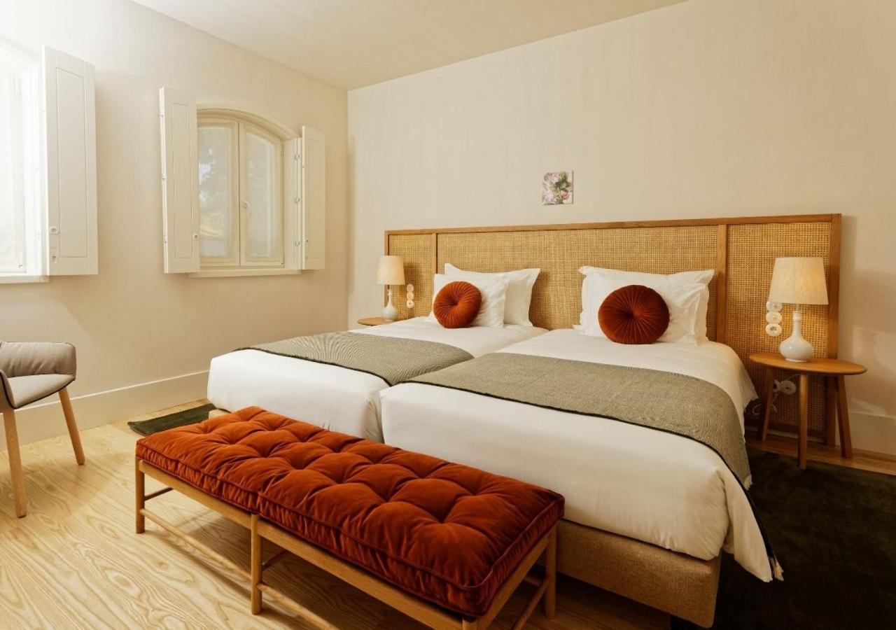 Montebelo Vista Alegre Ilhavo Hotel Εξωτερικό φωτογραφία A bedroom at the hotel