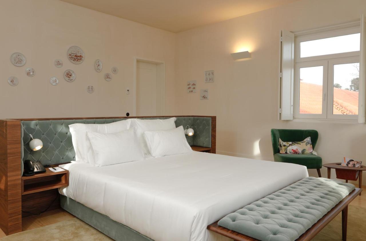 Montebelo Vista Alegre Ilhavo Hotel Εξωτερικό φωτογραφία A bedroom at the hotel