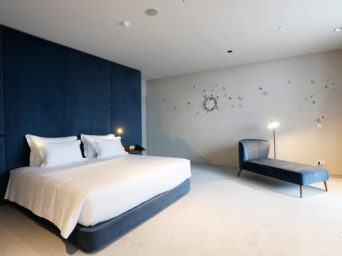 Montebelo Vista Alegre Ilhavo Hotel Εξωτερικό φωτογραφία A bedroom at the hotel
